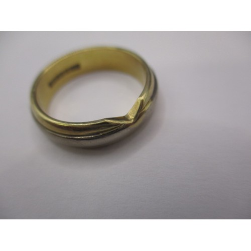 36 - An 18ct yellow and white gold wedding band, approx. ring size ‘K’, approx. width 4.86mm, approx. wei... 