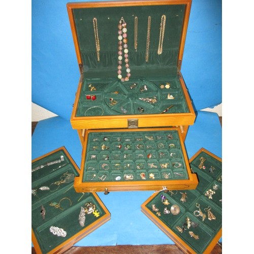 88 - A large wood multi compartment jewellery box, with contents of vintage costume jewellery