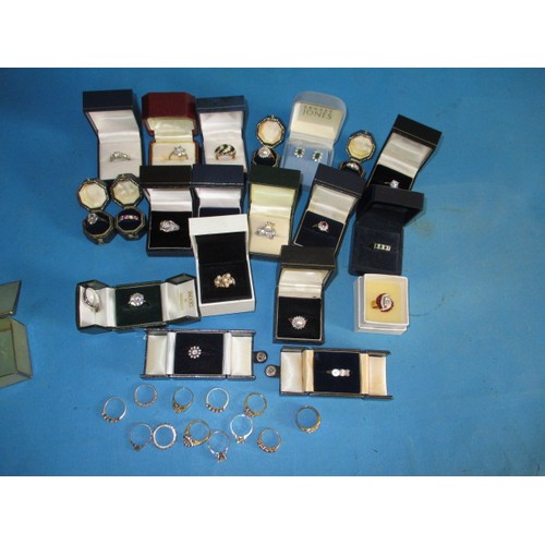 92 - A parcel of vintage costume jewellery rings, approx. 31 in total, and a pair of earrings, most in bo... 