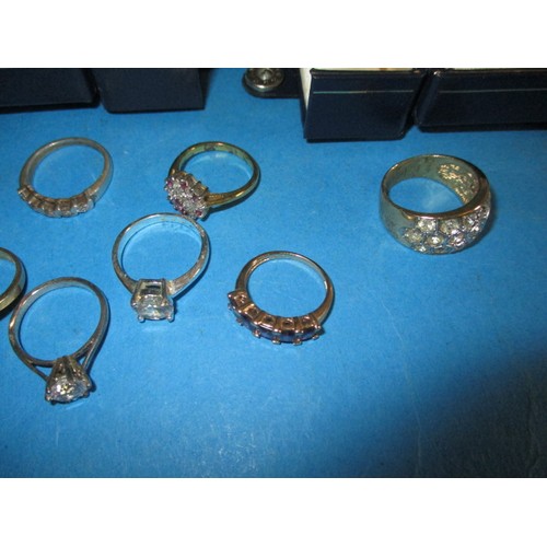 92 - A parcel of vintage costume jewellery rings, approx. 31 in total, and a pair of earrings, most in bo... 