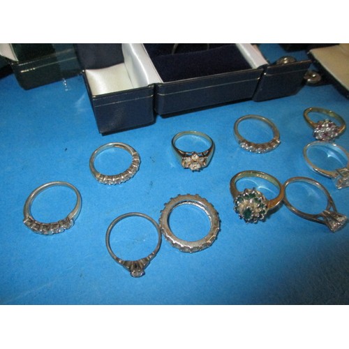 92 - A parcel of vintage costume jewellery rings, approx. 31 in total, and a pair of earrings, most in bo... 