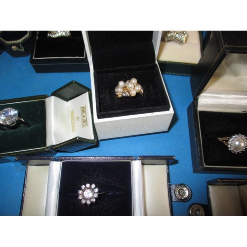 92 - A parcel of vintage costume jewellery rings, approx. 31 in total, and a pair of earrings, most in bo... 