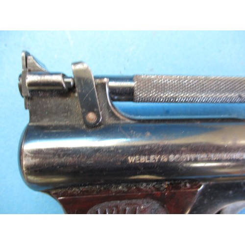 220 - A Webley senior air pistol in leather holster, and a Perfecta starter pistol, in used condition and ... 