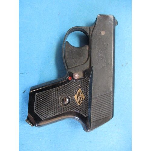 220 - A Webley senior air pistol in leather holster, and a Perfecta starter pistol, in used condition and ... 