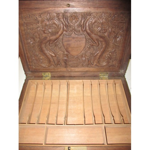 293 - A profusely carved antique Japanese hard wood box, approx. size 31x20x5cm in good used condition