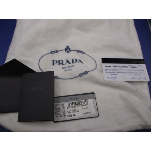 185 - A genuine PRADA chain shoulder crossbody bag, soft calf leather in colour ‘Rosso’, 1BH084. In unused... 