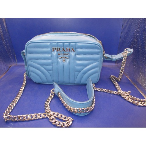 186 - A genuine PRADA chain shoulder crossbody bag, soft calf leather in colour ‘Mare’, 1BH084. In unused ... 