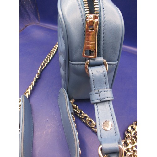 186 - A genuine PRADA chain shoulder crossbody bag, soft calf leather in colour ‘Mare’, 1BH084. In unused ... 