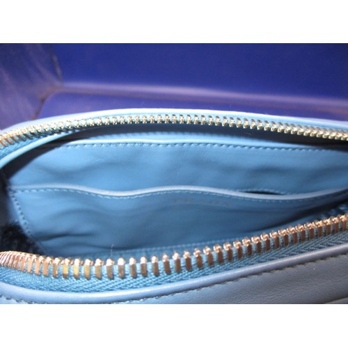 186 - A genuine PRADA chain shoulder crossbody bag, soft calf leather in colour ‘Mare’, 1BH084. In unused ... 