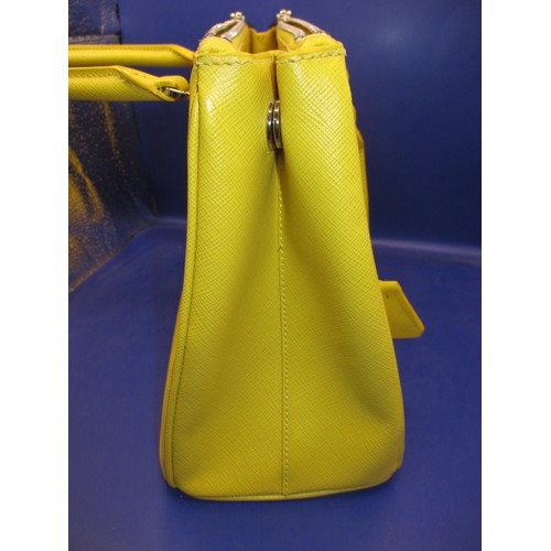 188 - A genuine PRADA small zip tote bag, material ‘Saffiano Lux Leather’, in colour ‘Sole 1’, 1BA863. In ... 