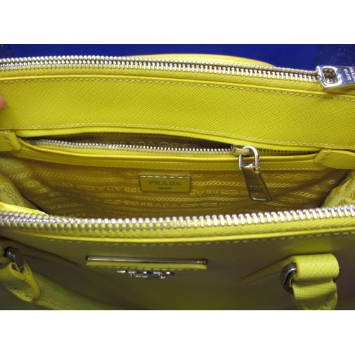 188 - A genuine PRADA small zip tote bag, material ‘Saffiano Lux Leather’, in colour ‘Sole 1’, 1BA863. In ... 