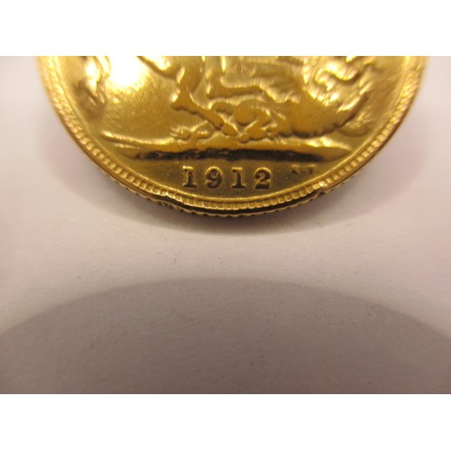 133 - A George V full gold sovereign dated 1912, a BV grade coin with good definition of features