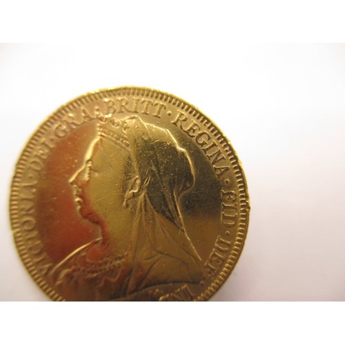 134 - A Victorian full gold sovereign dated 1894, a BV grade coin with reasonable definition of features