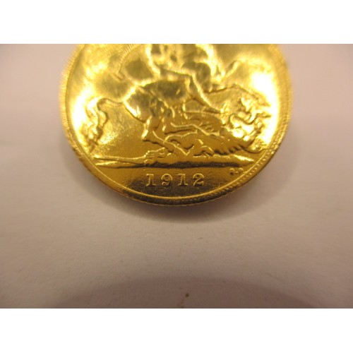 140 - A George V gold half sovereign dated 1912, a BV grade coin with good definition of features