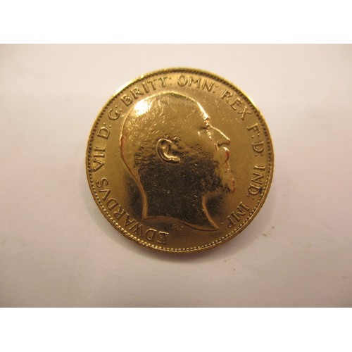 141 - An Edward VII gold half sovereign dated 1906, a BV grade coin with reasonable definition of features