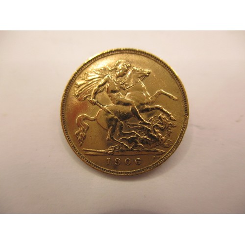 141 - An Edward VII gold half sovereign dated 1906, a BV grade coin with reasonable definition of features