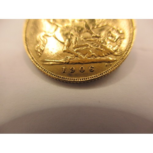 141 - An Edward VII gold half sovereign dated 1906, a BV grade coin with reasonable definition of features