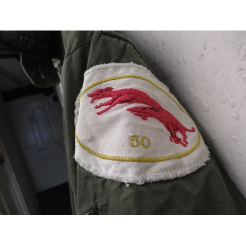 217 - An RAF Bomber jacket with 50 squadron Vulcan B2 patch, in used condition with working zips and butto... 