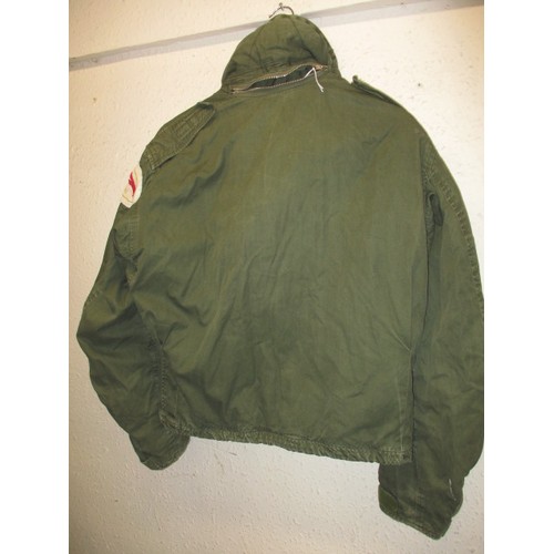 217 - An RAF Bomber jacket with 50 squadron Vulcan B2 patch, in used condition with working zips and butto... 