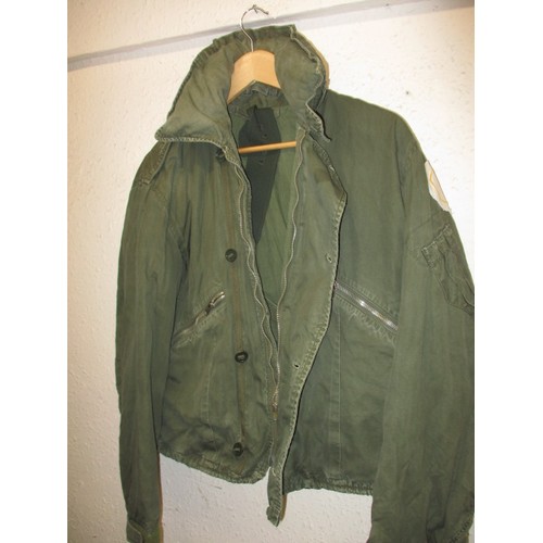 217 - An RAF Bomber jacket with 50 squadron Vulcan B2 patch, in used condition with working zips and butto... 