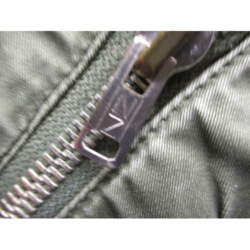 217 - An RAF Bomber jacket with 50 squadron Vulcan B2 patch, in used condition with working zips and butto... 