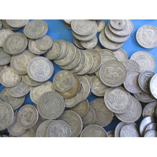 147 - A large quantity of pre-decimal part silver coins, approx. parcel weight 1922g, date range 1920-1946... 