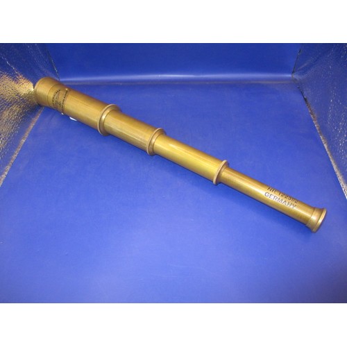 A vintage 3 draw brass telescope, having marks for German railway, in pre-owned condition