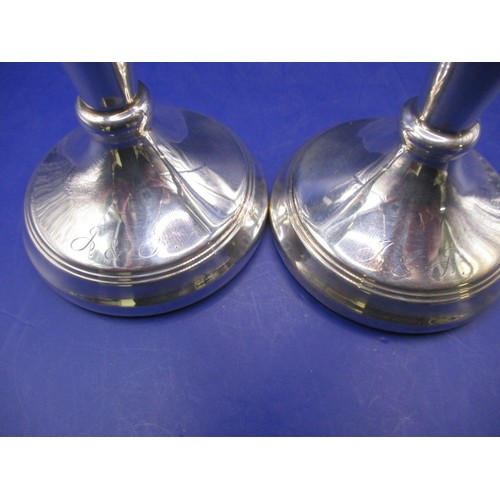 100 - A pair of vintage sterling silver candlesticks, approx. height 15cm, approx. gross weight 260g, in p... 