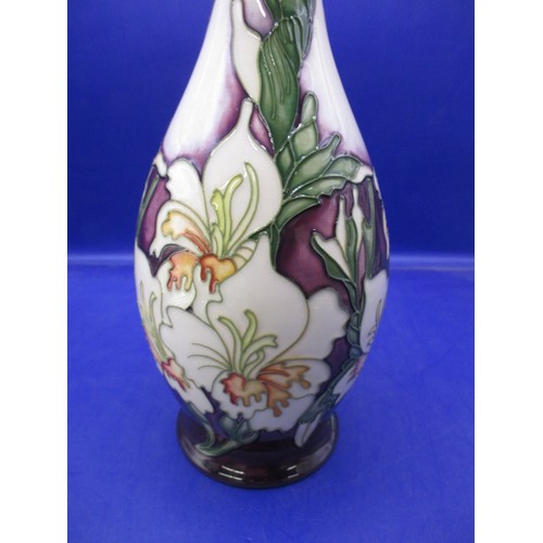 179 - A 2006 Moorcroft tube lined vase, approx. height 26cm in good pre-owned condition with no observed d... 