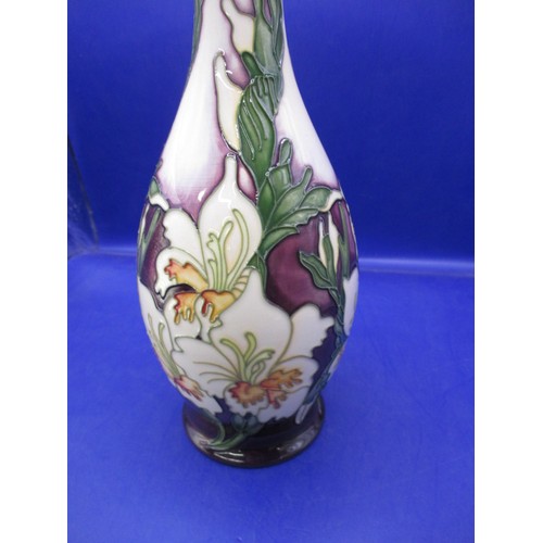 179 - A 2006 Moorcroft tube lined vase, approx. height 26cm in good pre-owned condition with no observed d... 