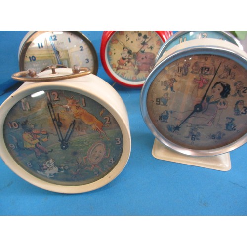 278 - Six vintage novelty alarm clocks, some with automaton dials, all run when wound, all with use relate... 