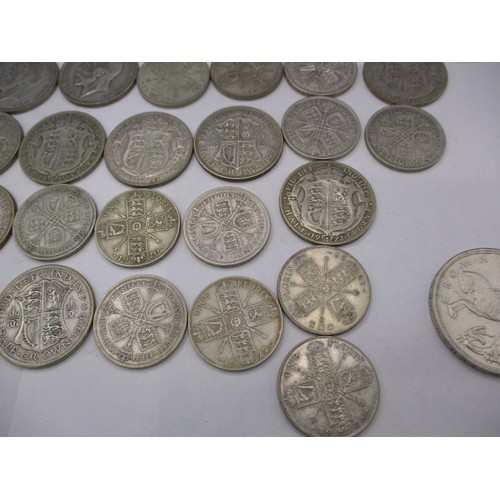 156 - A parcel of part silver coins, approx. parcel weight 499g, to include some very good grades, most in... 