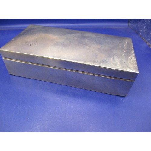 104 - A sterling silver cigarette box and cheroot case, in used condition with use-related marks