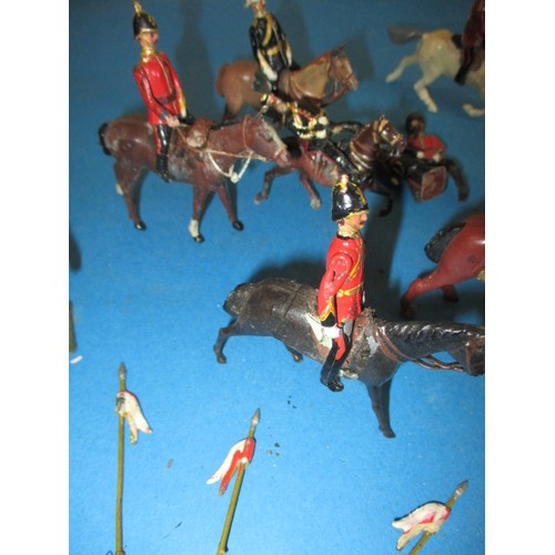 196 - A parcel of antique and later lead military figures, to include mounted examples, all in play worn c... 