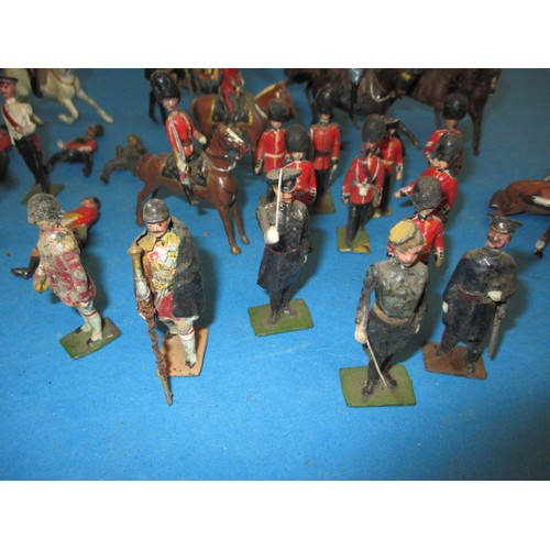 196 - A parcel of antique and later lead military figures, to include mounted examples, all in play worn c... 