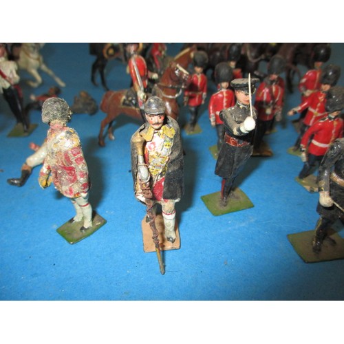 196 - A parcel of antique and later lead military figures, to include mounted examples, all in play worn c... 