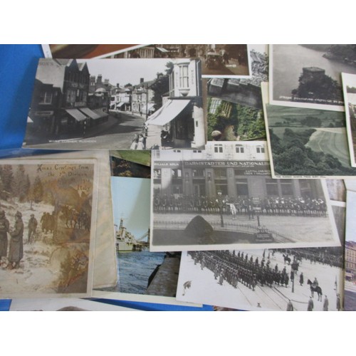 298 - A large quantity of antique and later post cards, to include military genre, all in used condition