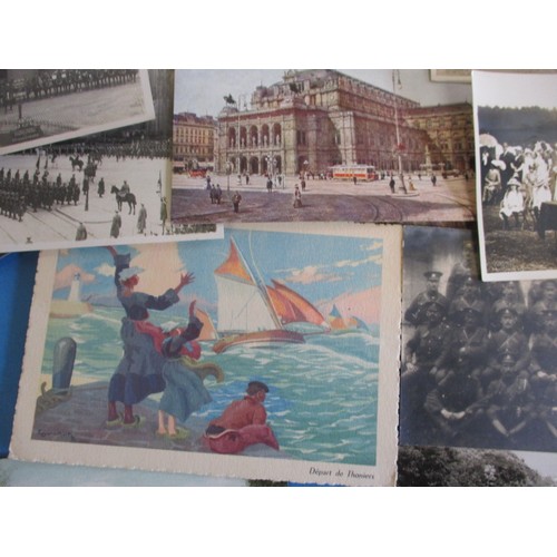 298 - A large quantity of antique and later post cards, to include military genre, all in used condition