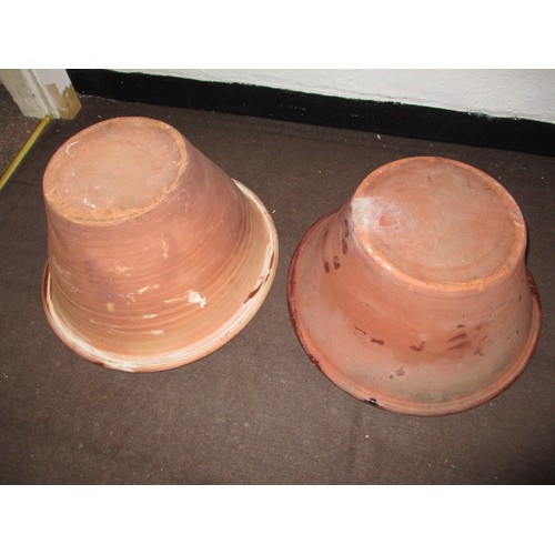 295 - 2 Large vintage terracotta dough bowls, approx. diameter of largest 47cm, the smaller one having a c... 