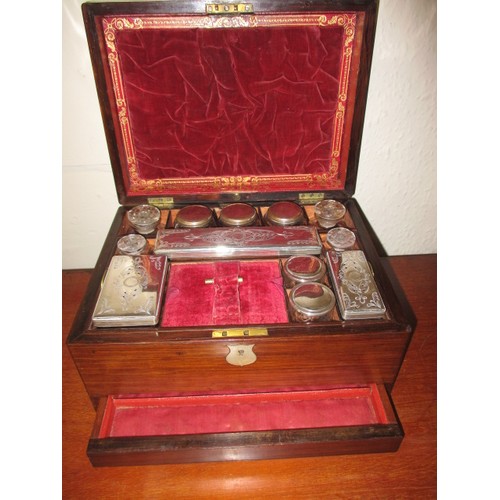 171 - A 19th century gentleman’s travelling valet box, with original contents of jars and pots, having low... 