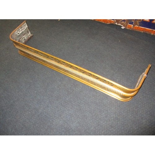 302 - A late 19th century brass fire fender and trivet, approx. width of fender 125cm in good used conditi... 