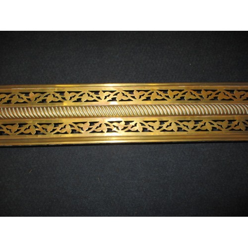 302 - A late 19th century brass fire fender and trivet, approx. width of fender 125cm in good used conditi... 