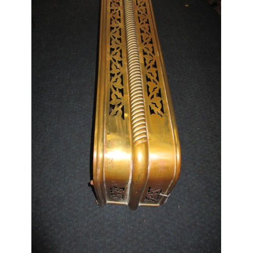 302 - A late 19th century brass fire fender and trivet, approx. width of fender 125cm in good used conditi... 