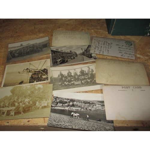 306 - A large quantity of vintage postcards, to include military and topographical examples, all in used c... 