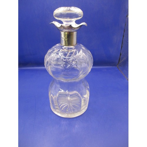 109 - An Edwardian silver mounted spirit decanter, with Chester hallmark, in good pre-owned condition, app... 