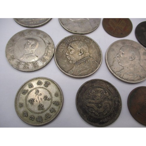 149 - A parcel of 19th century and later world coins, to include Chinese examples all in circulated condit... 