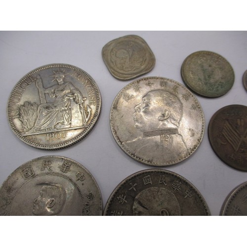 149 - A parcel of 19th century and later world coins, to include Chinese examples all in circulated condit... 