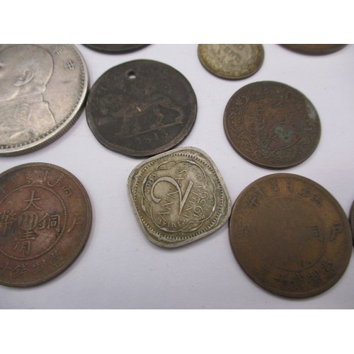 149 - A parcel of 19th century and later world coins, to include Chinese examples all in circulated condit... 