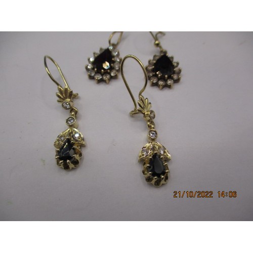 63 - Two pairs of earrings, one marked for gold the other yellow metal, having various types of stone, bo... 