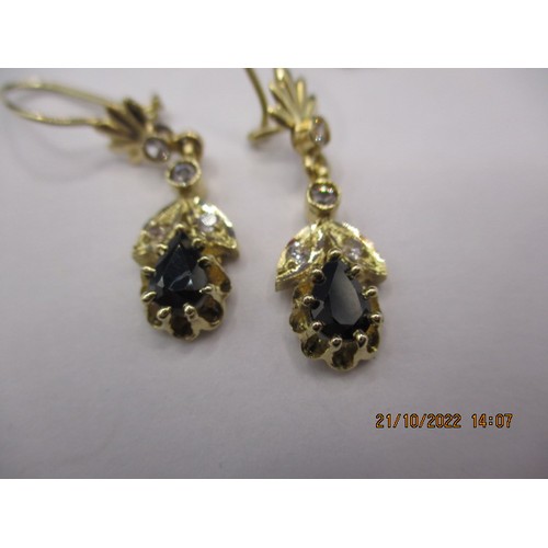 63 - Two pairs of earrings, one marked for gold the other yellow metal, having various types of stone, bo... 